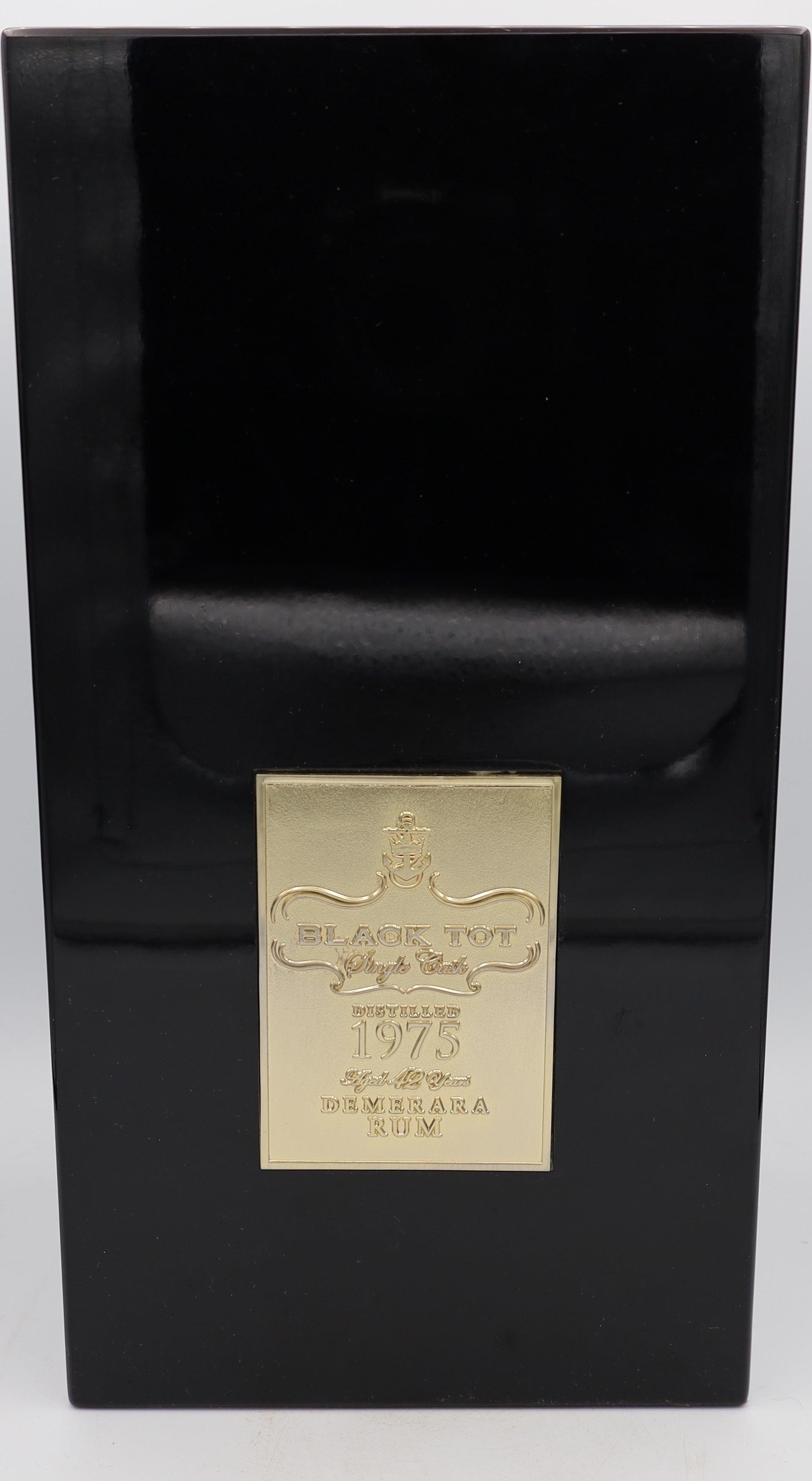 A Black Tot 42-Year-Old Demerara Rum, limited Reserved Treasures Club edition, presented in a collector’s box – exceptionally rare aged Caribbean rum with rich, complex flavors.