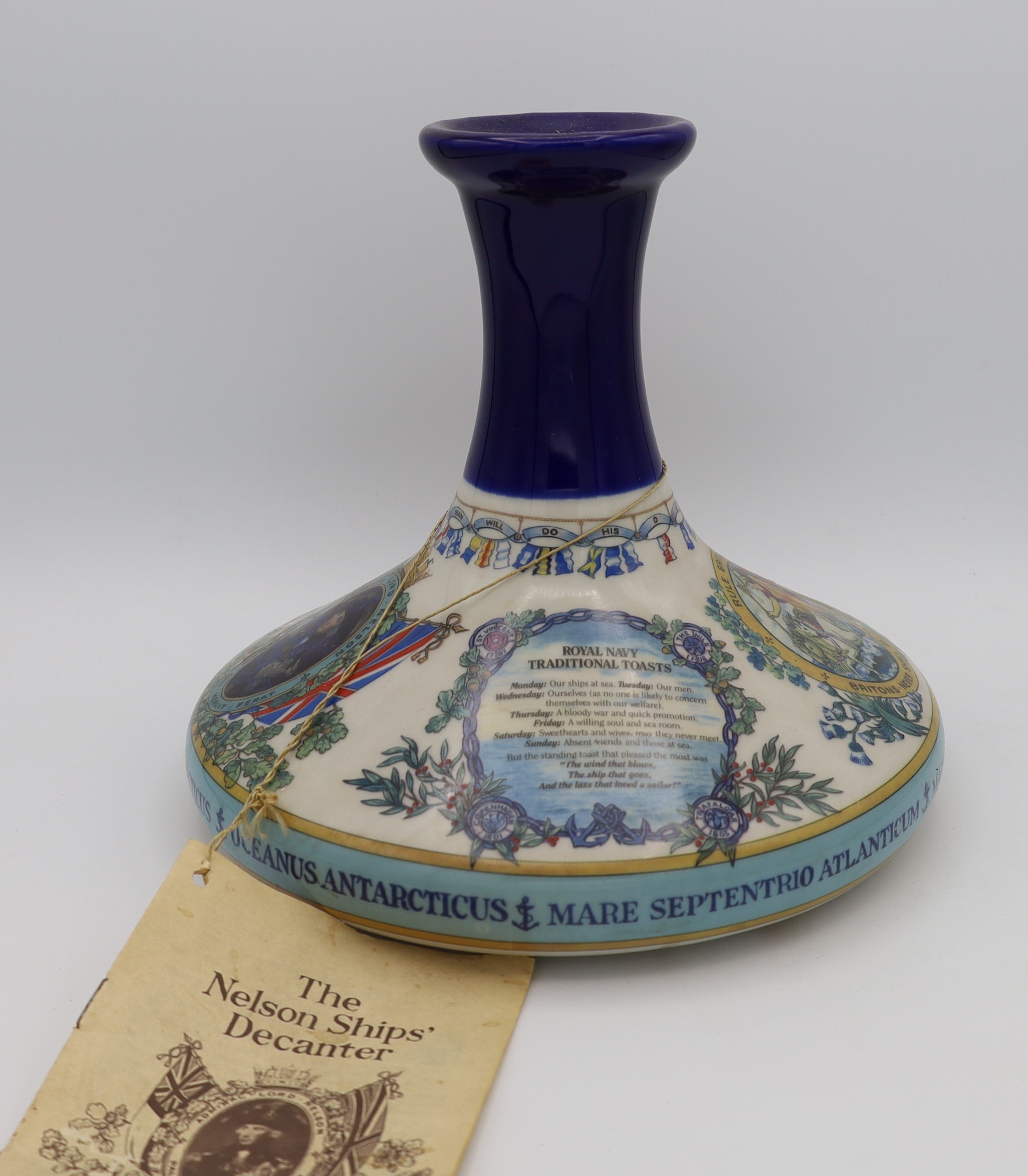 British Navy Pusser's Rum in a ceramic decanter – premium Caribbean rum with rich, full-bodied flavors, traditionally crafted and aged.