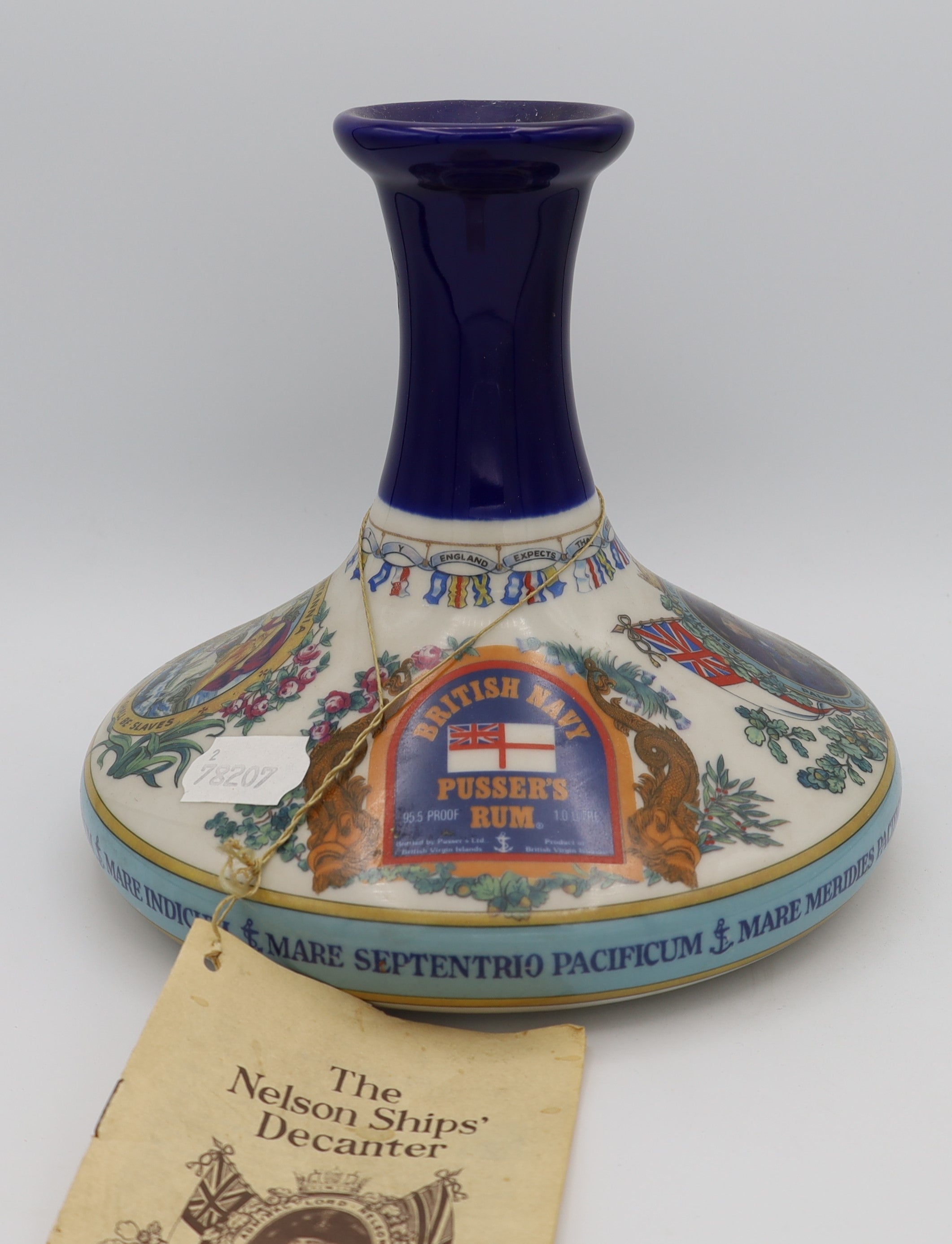 British Navy Pusser's Rum in a ceramic decanter – premium Caribbean rum with rich, full-bodied flavors, traditionally crafted and aged.