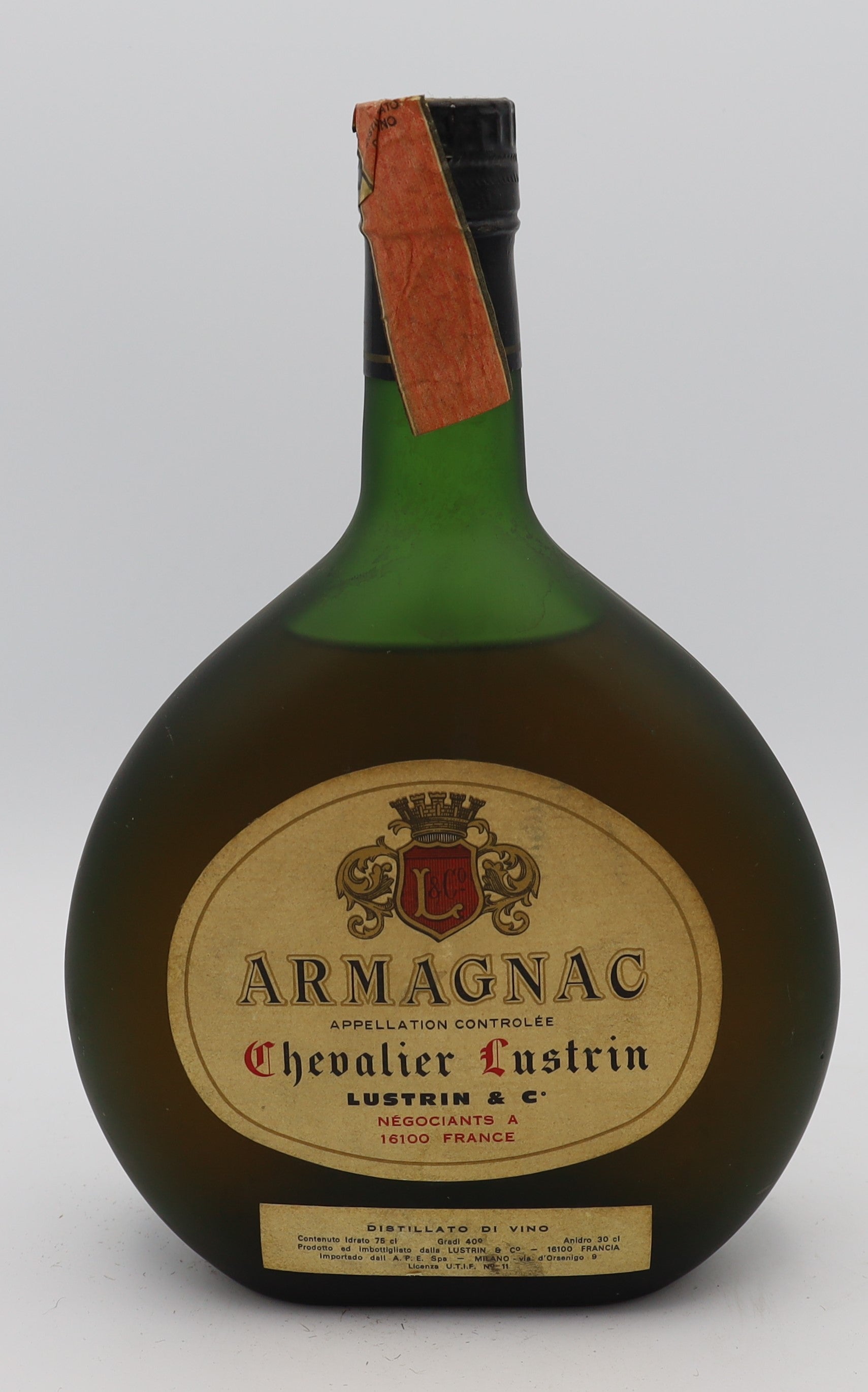 Chevalier Lustrin Armagnac Appellation Contrôlée with creme label in green bottle – premium aged brandy with rich, smooth flavors, ideal for collectors.