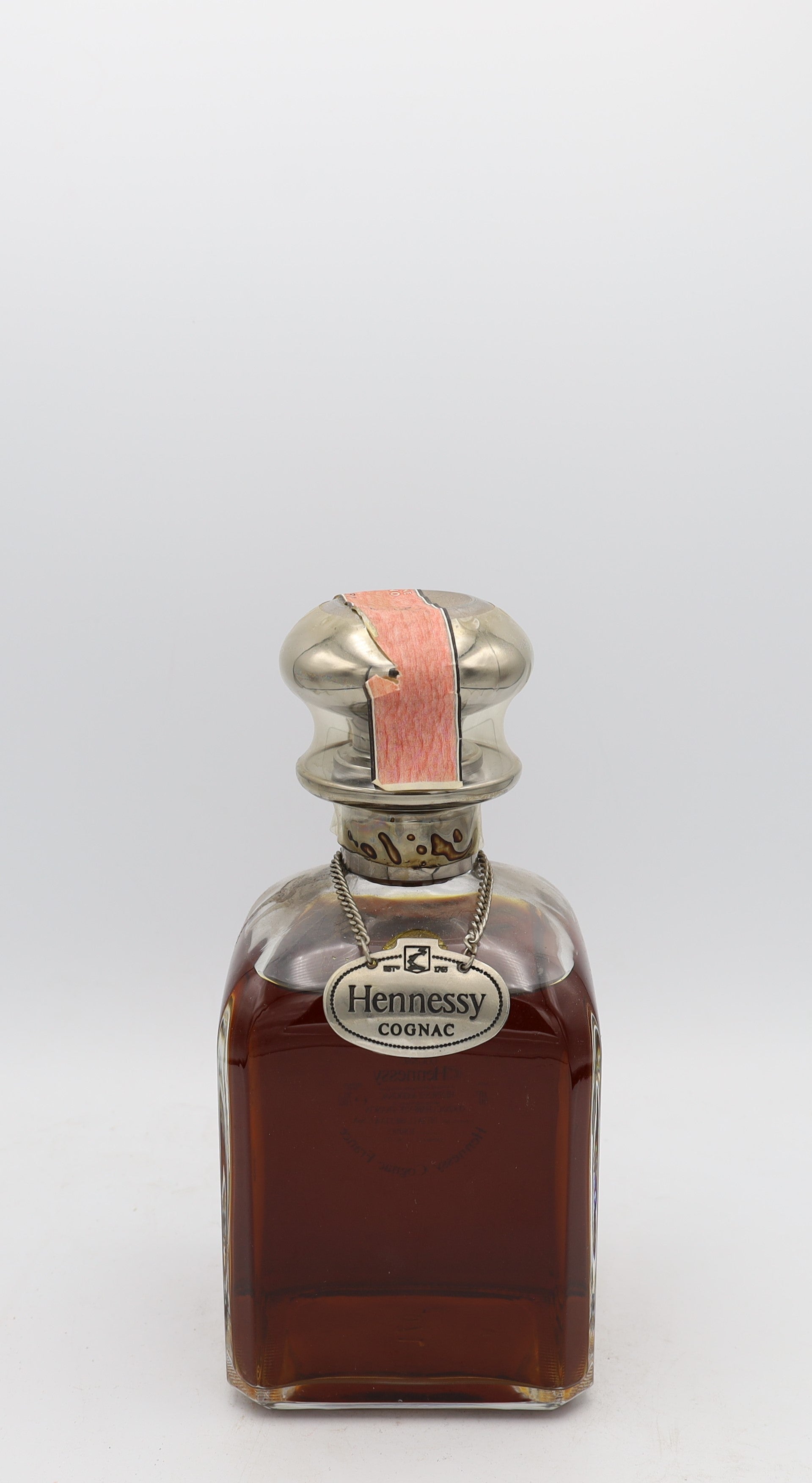 Hennessy Cognac silver top decanter – rear view of premium French cognac bottle, elegant collectible design