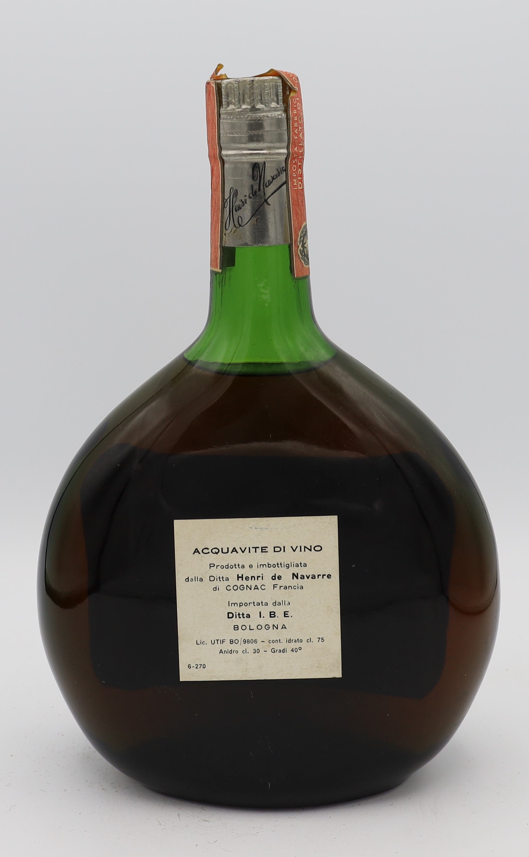 Henri de Navarre Grand Armagnac Vintage 1960s in green bottle with silver cap – rare aged brandy with rich, complex flavors, perfect for collectors.