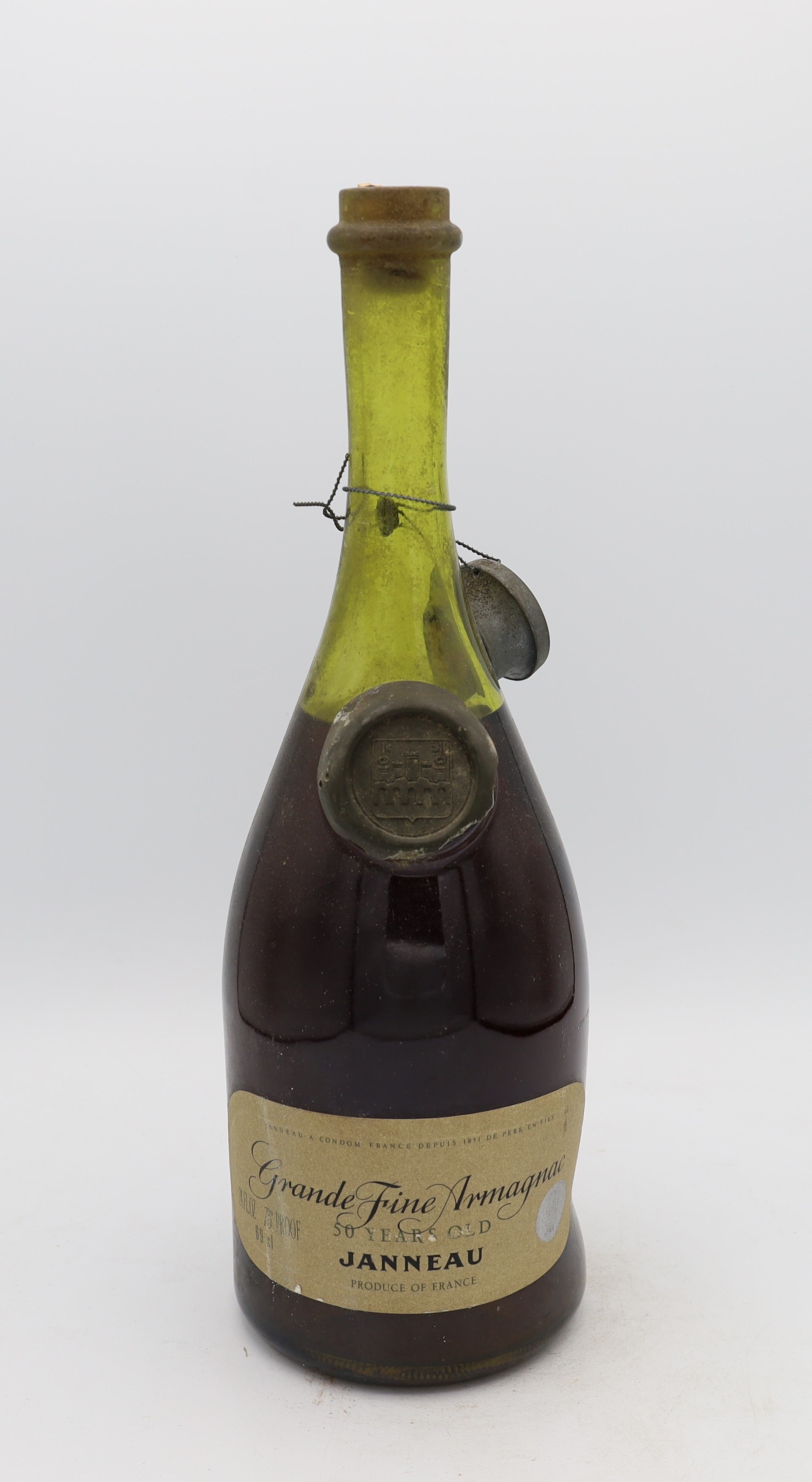 Janneau 50-Year-Old Grande Armagnac – exceptionally rare aged brandy with rich, complex flavors, presented for collectors.