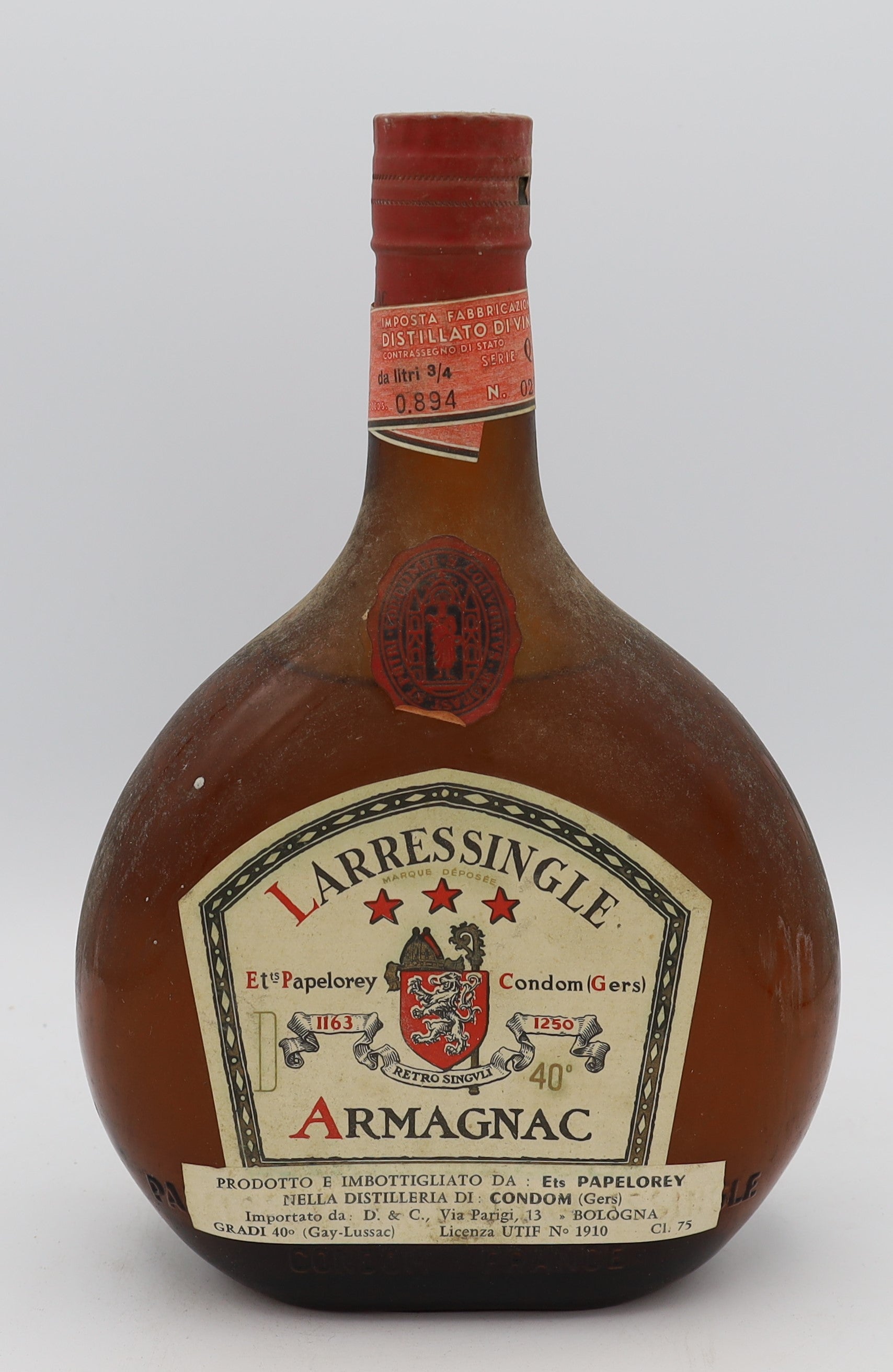 Larressingle 3 Star Armagnac Et Papelorey with red cap and no neck label – premium aged brandy with smooth, rich flavors, ideal for collectors.