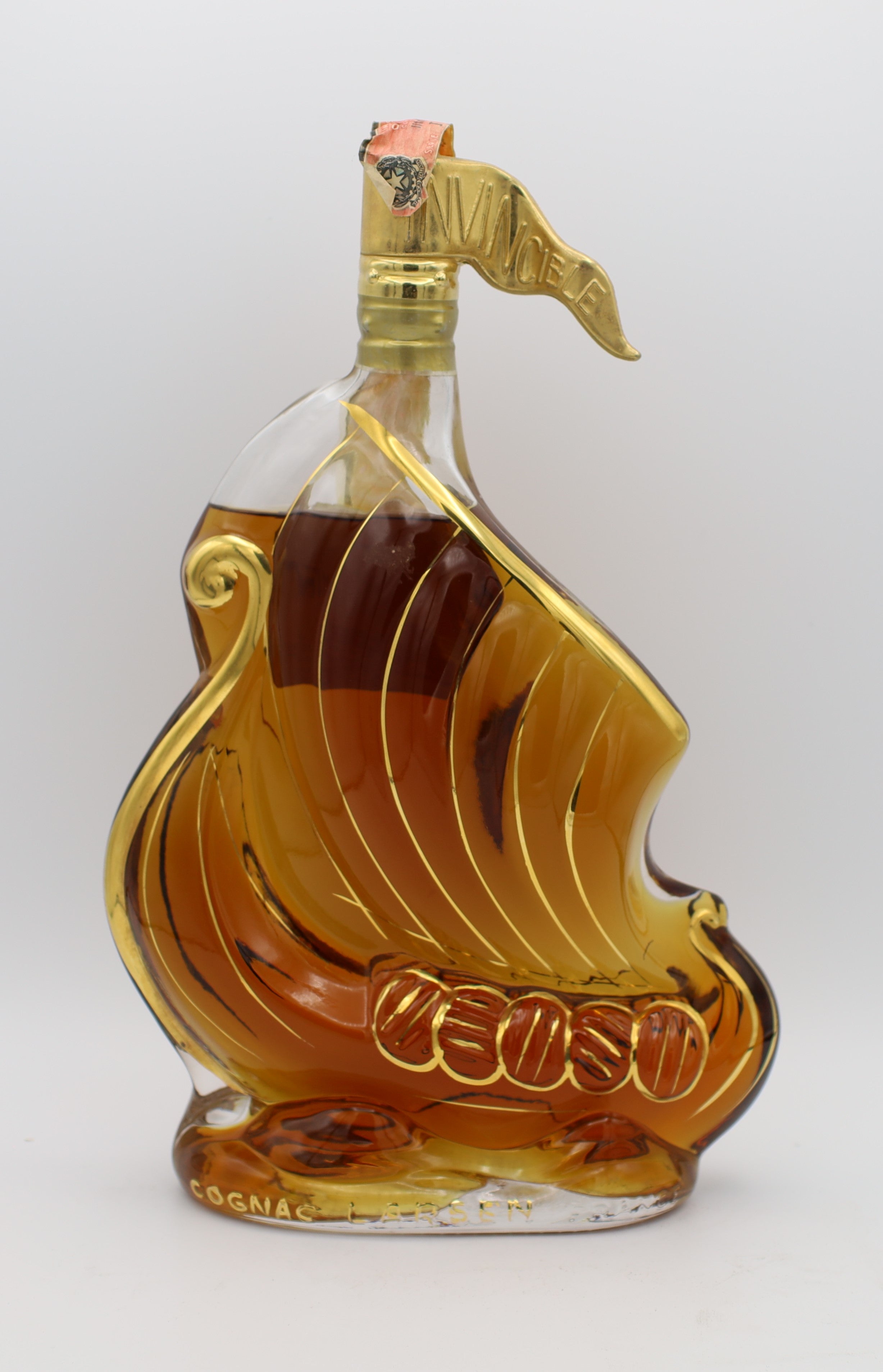 Larsen Fine Champagne Cognac – Invincible Viking Ship edition, premium French brandy with rich amber color, presented in a unique Viking ship-themed bottle, ideal for collectors.