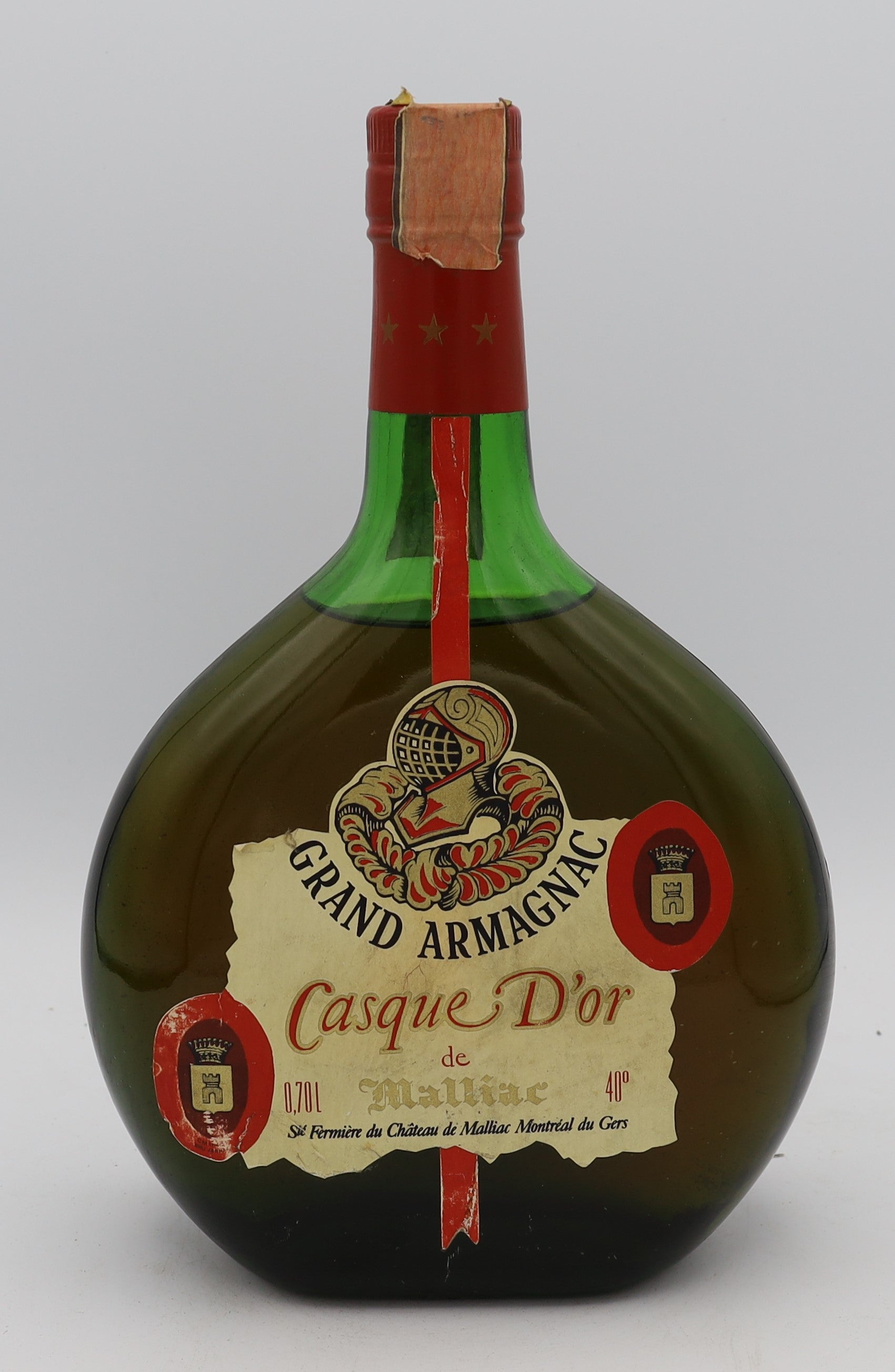 Malliac Casque d'Or Grand Armagnac in green bottle with red cap – premium aged brandy with rich, complex flavors, ideal for collectors and connoisseurs.