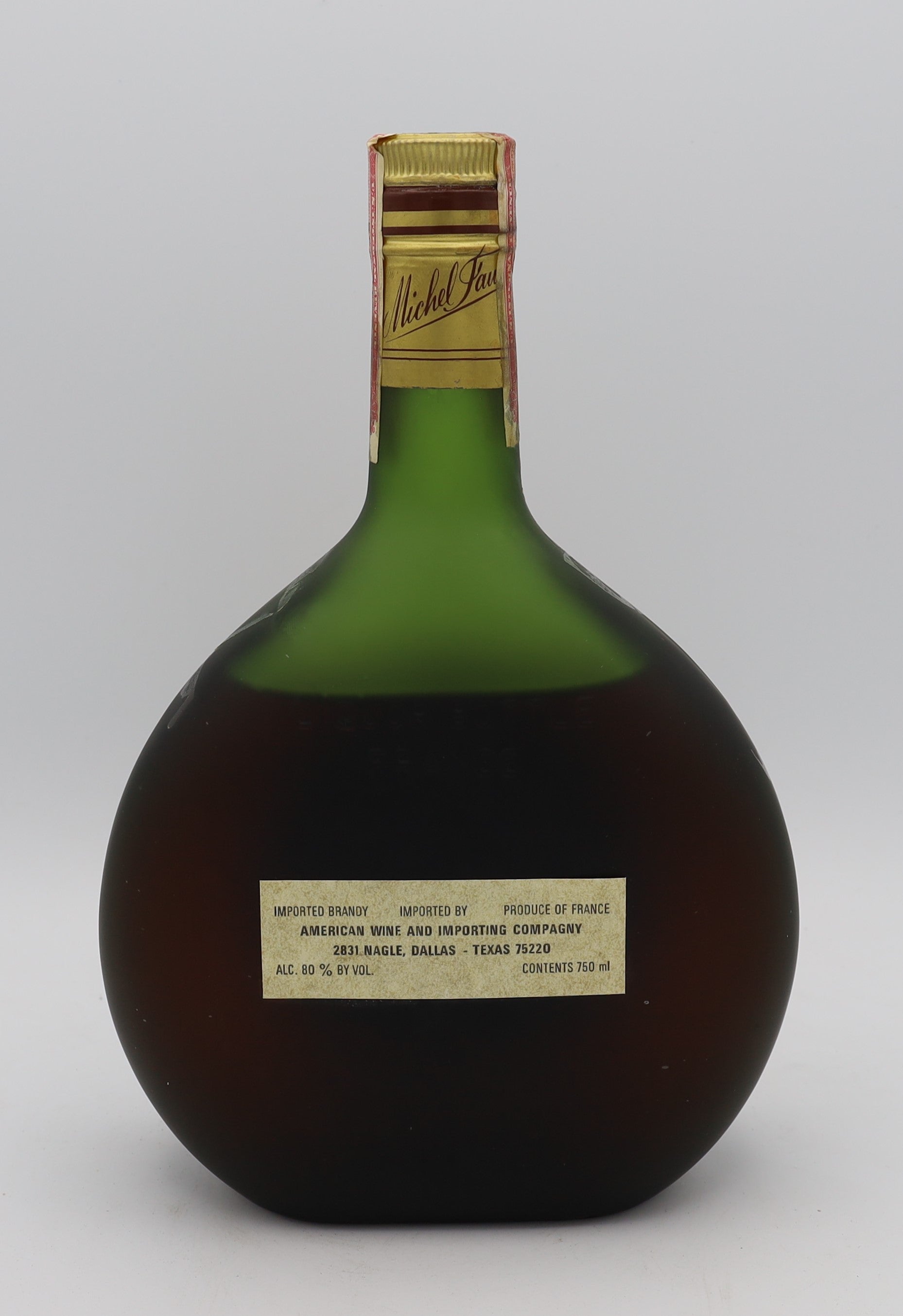 Michel Faure Vieille Reserve Armagnac with gold label in green bottle – premium aged brandy with rich, smooth flavors, ideal for collectors and connoisseurs.