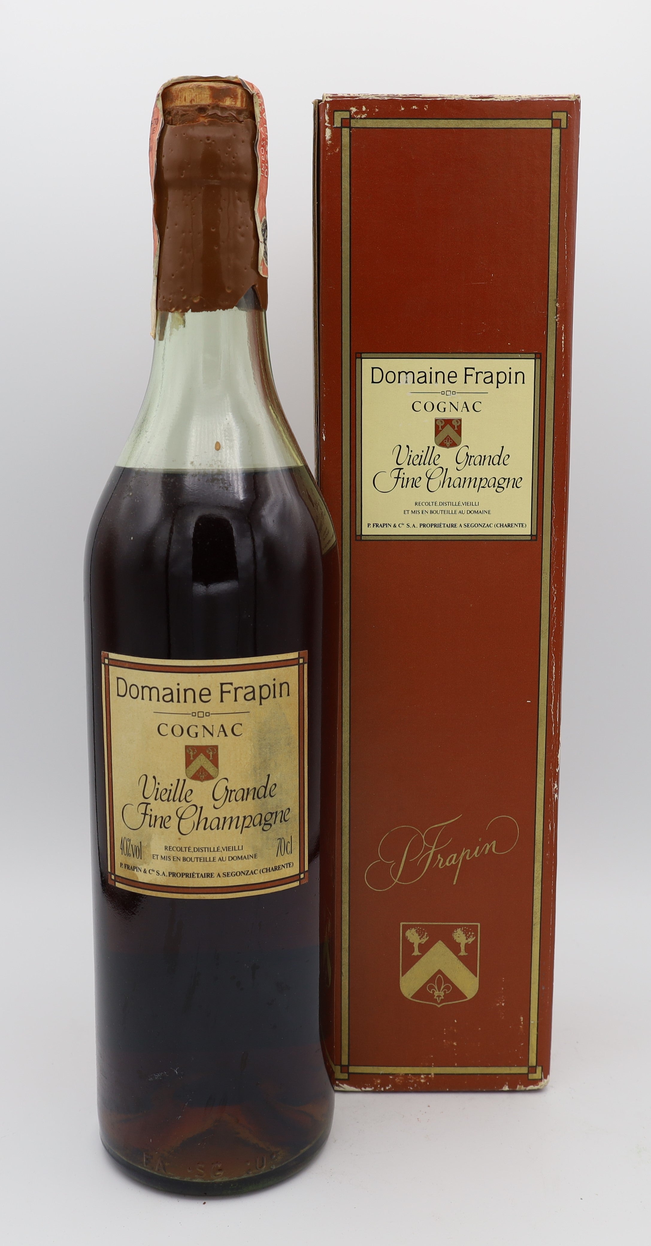 Domaine Frapin Cognac – vintage 1990s, premium French brandy with rich amber color, smooth and complex flavors, presented in a collector’s box, ideal for connoisseurs.